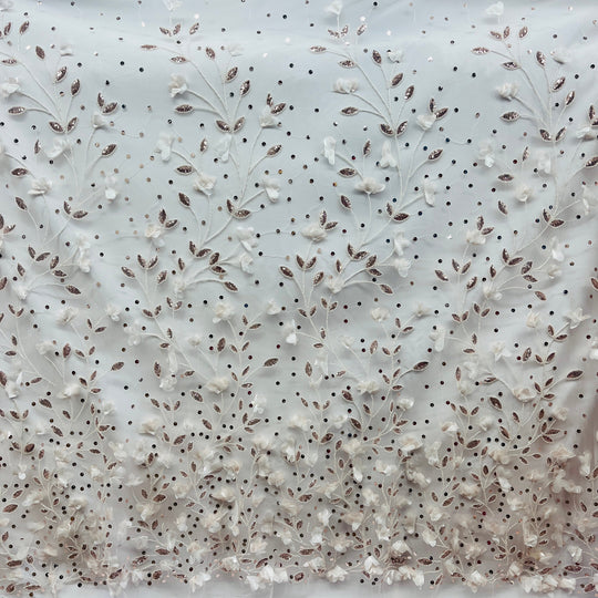 White floral embroidered lace fabric with blush leaf accents and beading