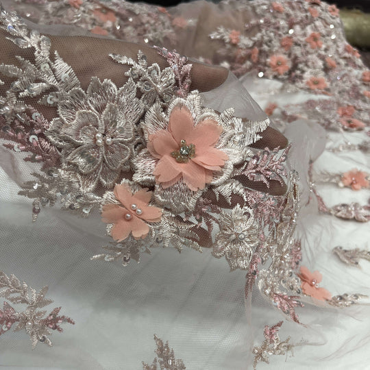 Close-up of decorative Blushy pink lace fabric with 3D embroidered floral patterns, embellished with beads and rhinestones – LaceUSA GD2880