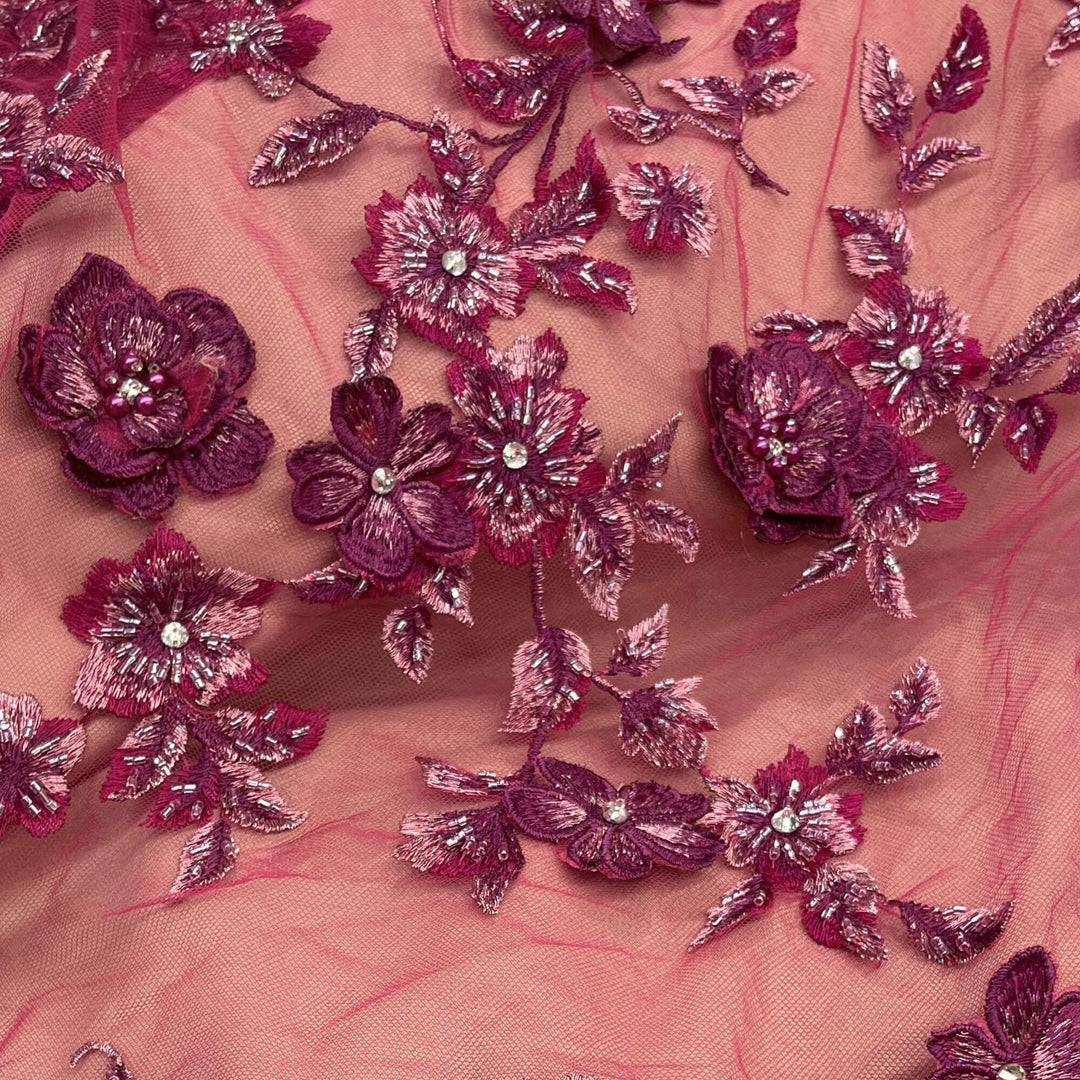 Closeup of Fuchsia Beaded 3D Floral Lace-Fabric Embroidered on net mesh by LaceUSA  item GD1613 