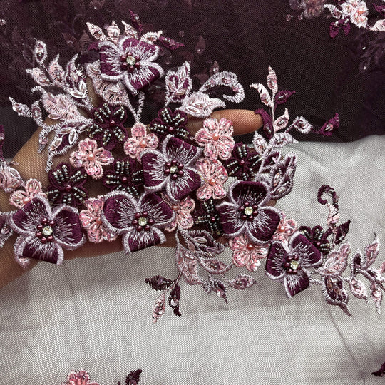 Closeup of Lace USA GD-3040 3D magenta floral lace, embellished with beads and rhinestones—ideal for dresses, gowns, and formalwear.