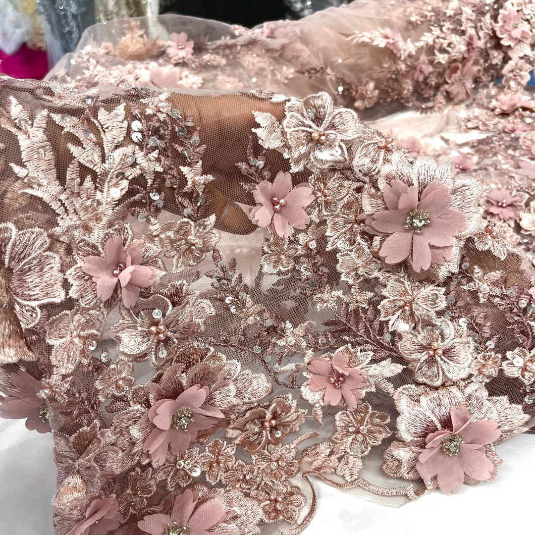Closeup view of mauve 3D embroidered floral lace fabric, embellished with beads and rhinestones – LaceUSA GD2880