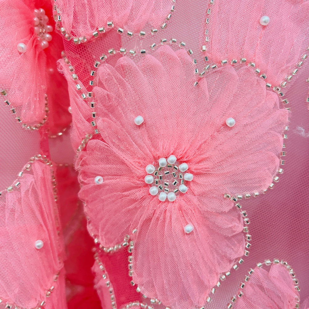 Peach 3D beaded lace fabric close-up showing floral embroidery and pearl accents | Lace USA - GD-216