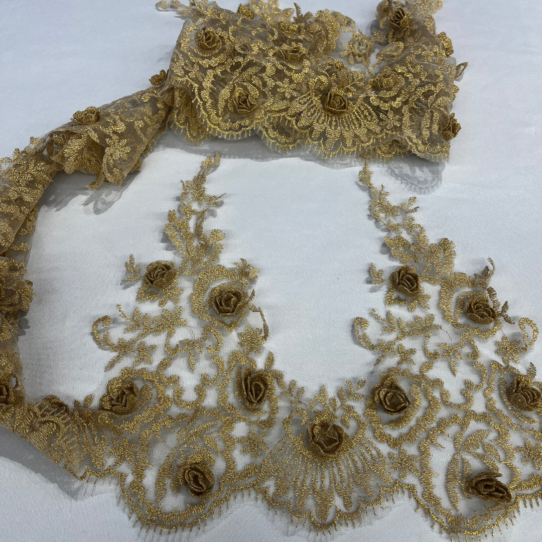 Gold lace trim with embroidered 3D rose motifs on net mesh, laid out on a white  background. Lace USA #21856W