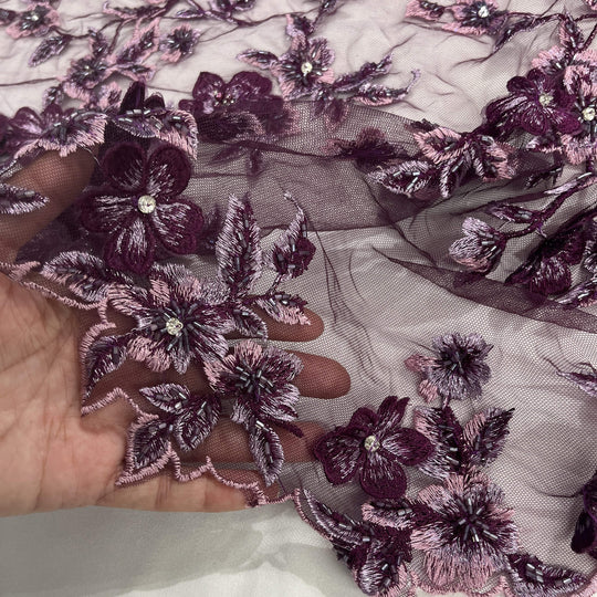 Close-up of Lace USA GD-1613 3D magenta floral lace with bead and rhinestone embellishments, highlighting multicolor flower edging—ideal for gowns

