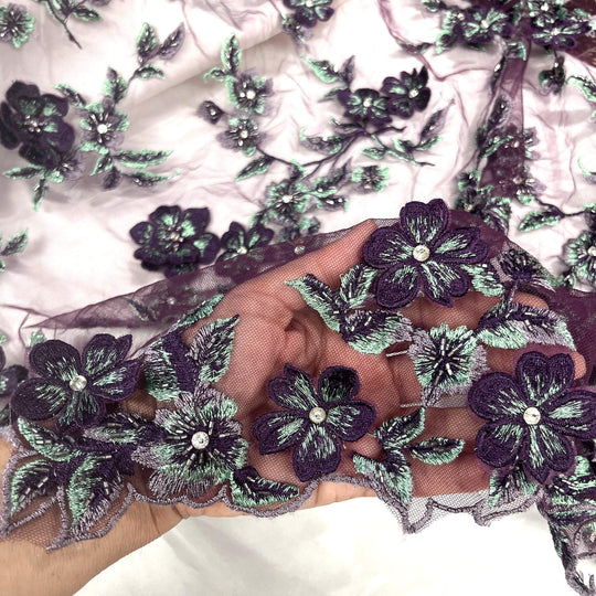 Close-up of Lace USA GD-1613 3D floral lace in plum and mint, embellished with beads and rhinestones—ideal for gowns and formalwear