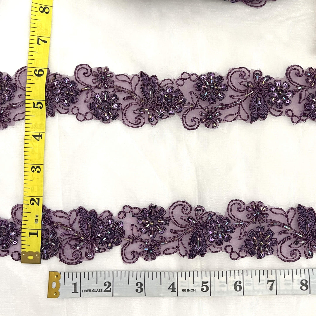 Plum lace trim with floral and leaf patterns with measuring tape |LaceUSA 96283N-BP