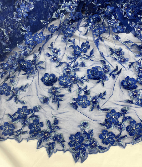 Partial view of Lace USA GD-1613 3D royal blue floral lace with bead and rhinestone embellishments, featuring scalloped edging—ideal for gowns.