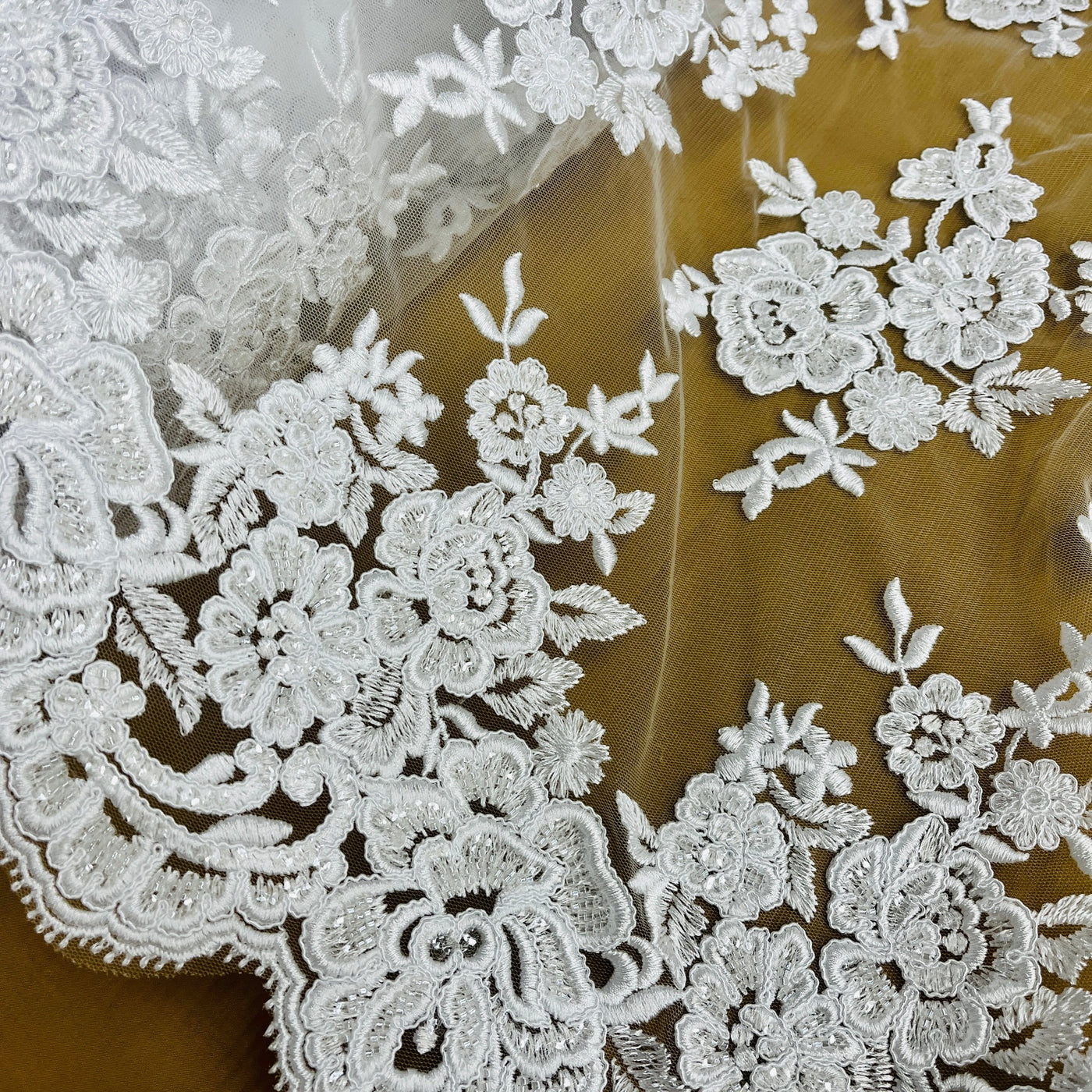 Beaded & Corded Bridal Lace Fabric Embroidered on 100% Polyester Net Mesh | Lace USA