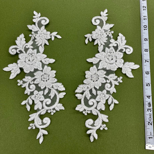 Beaded & Corded Silver Floral Appliqué Lace Embroidered on 100% Polyester Organza or Net Mesh. This can be applied to Theatrical dance ballroom costumes, bridal dresses, bridal headbands endless possibilities. Sold By Pair. Lace Usa