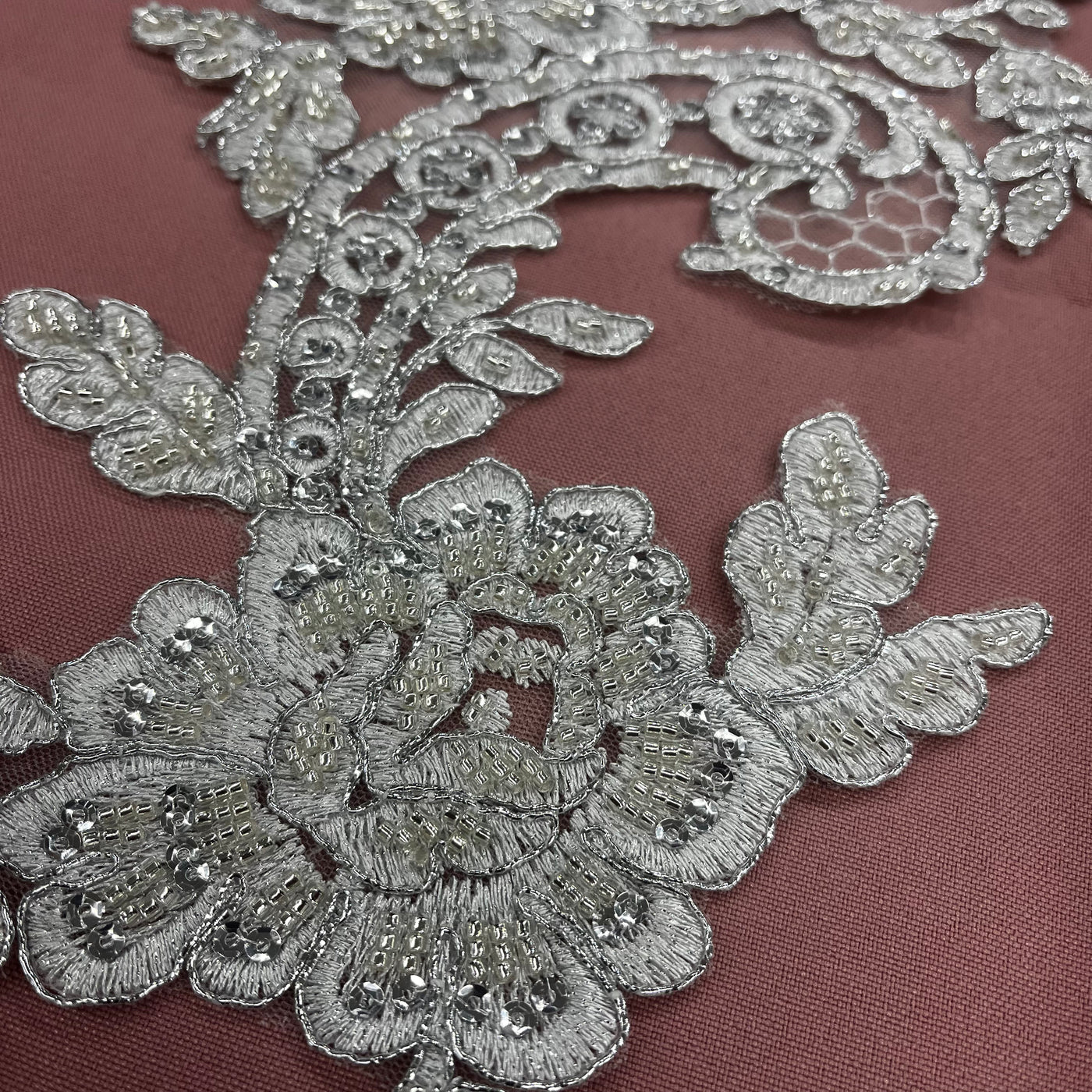 Beaded & Corded Floral Appliqué Lace Embroidered on 100% Polyester Organza or Net Mesh. This can be applied to Theatrical dance ballroom costumes, bridal dresses, bridal headbands endless possibilities. Sold By Pair Lace Usa