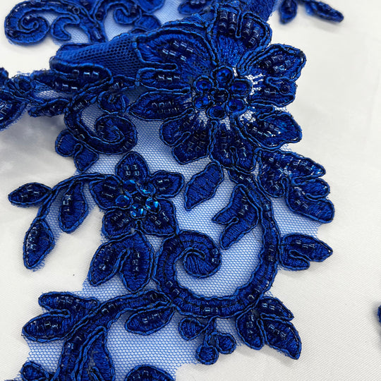 Beaded & Corded Silver Floral Appliqué Lace Embroidered on 100% Polyester Organza or Net Mesh. This can be applied to Theatrical dance ballroom costumes, bridal dresses, bridal headbands endless possibilities. Sold By Pair. Lace Usa