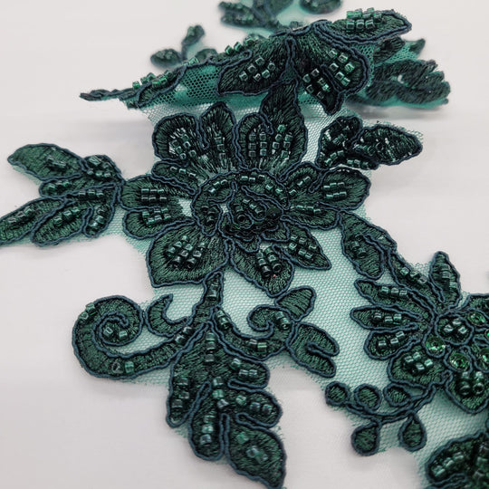 Beaded & Corded Silver Floral Appliqué Lace Embroidered on 100% Polyester Organza or Net Mesh. This can be applied to Theatrical dance ballroom costumes, bridal dresses, bridal headbands endless possibilities. Sold By Pair. Lace Usa