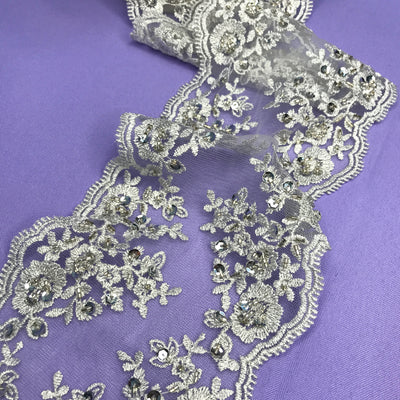 Double Sided Beaded Silver Trimming, Embroidered on 100 % Polyester Net Mesh.  Sold by the Yard.  Lace Usa