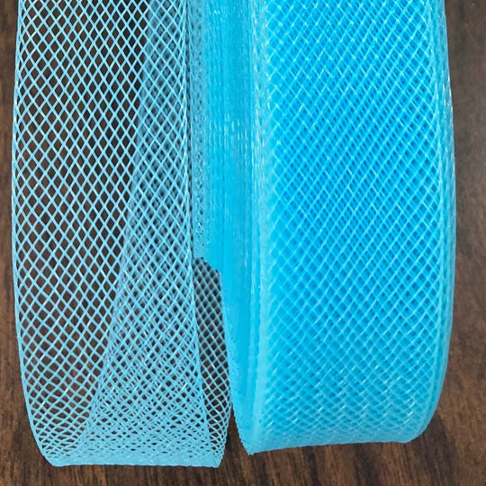 1-inch stiff crinoline horsehair braid trim made from 100% nylon for sewing hems, veils, and costumes. Aqua color.  Sold by the yard.  Lace Usa