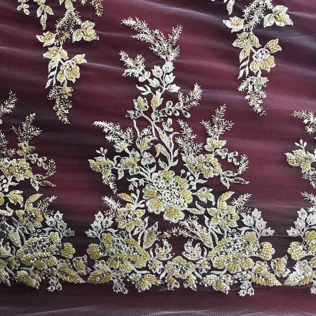 Embroidered & Heavily Beaded Fabric on net.  Sold by the yard.  Lace Usa