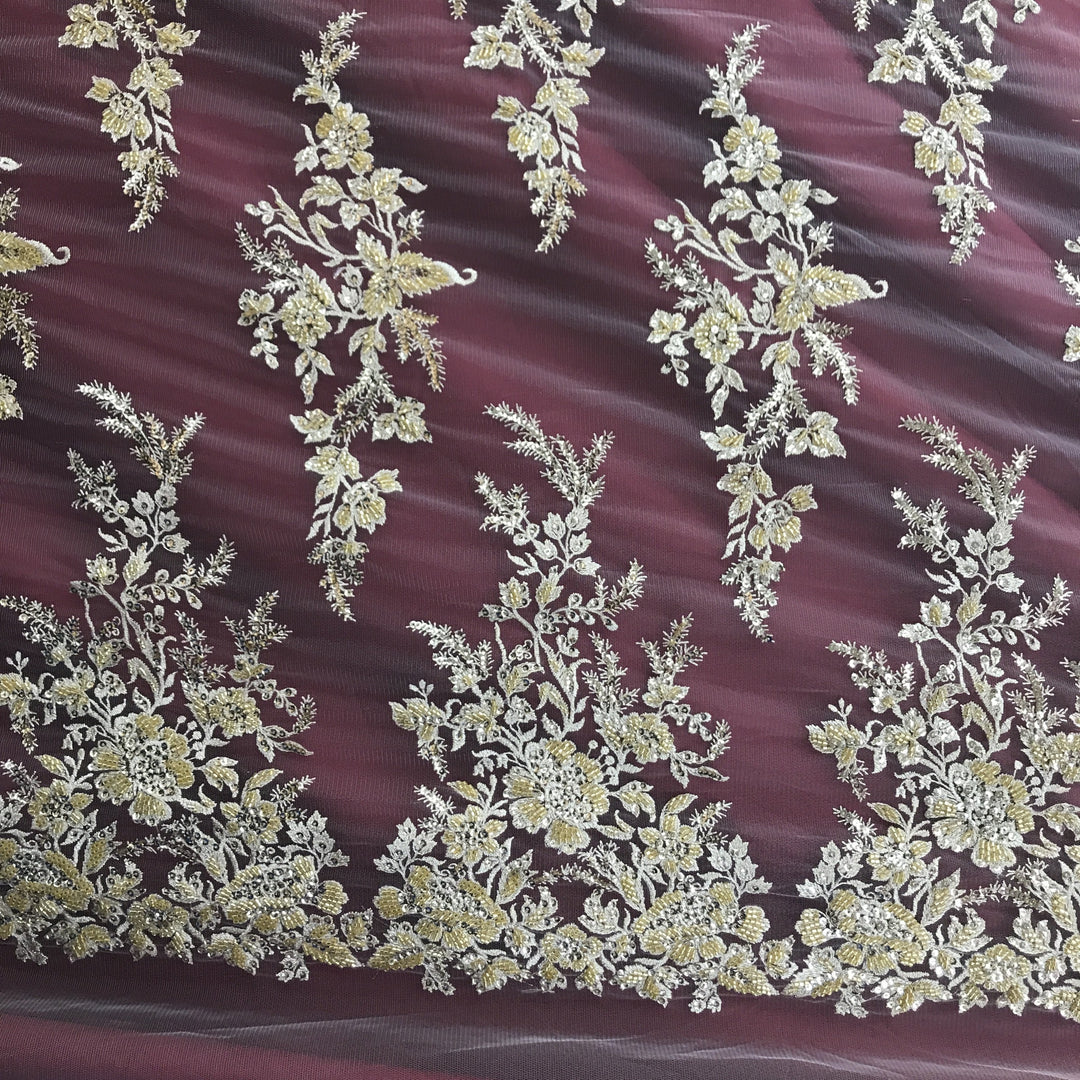 Embroidered & Heavily Beaded Fabric on net.  Sold by the yard.  Lace Usa