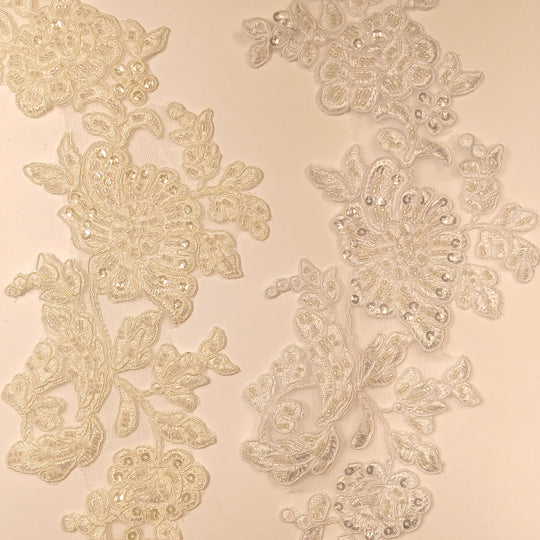 Beaded & Corded Floral Appliqué Lace Embroidered on 100% Polyester Organza or Net Mesh. This can be applied to Theatrical dance ballroom costumes, bridal dresses, bridal headbands endless possibilities.  Sold By Pair.  Lace Usa