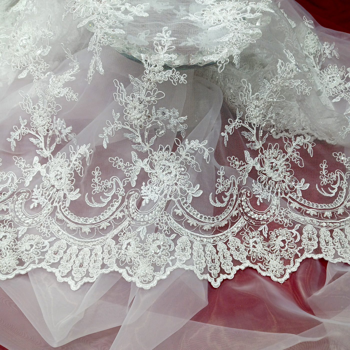 Corded & Beaded Bridal Lace Fabric Embroidered on 100% Polyester Net Mesh.  Sold the yard.  Lace Usa