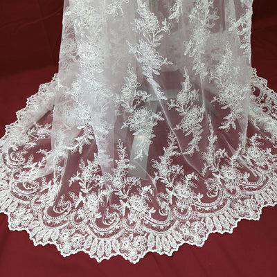 Corded & Beaded Bridal Lace Fabric Embroidered on 100% Polyester Net Mesh.  Sold the yard.  Lace Usa