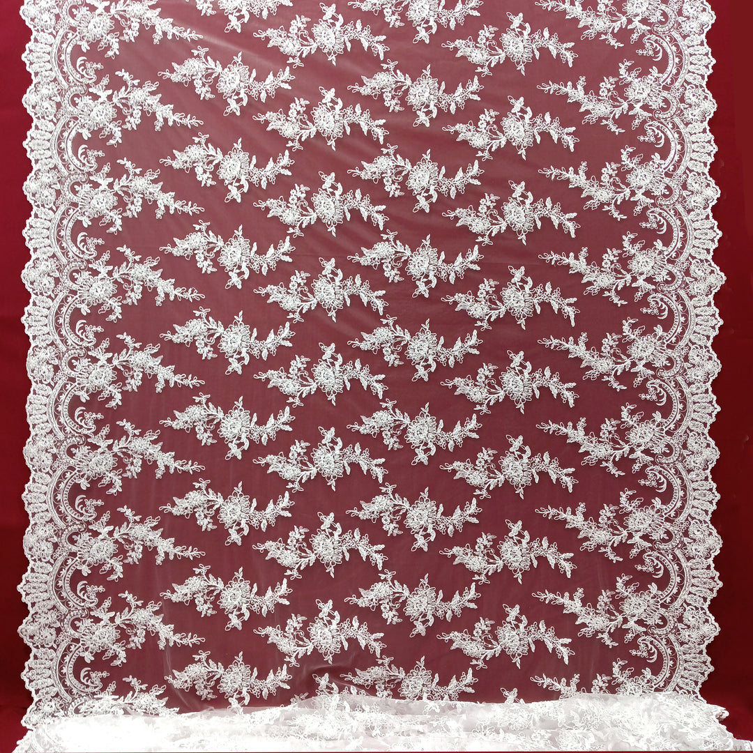 Corded & Beaded Bridal Lace Fabric Embroidered on 100% Polyester Net Mesh.  Sold the yard.  Lace Usa