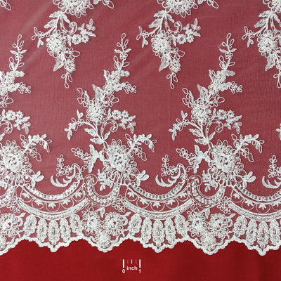 Corded & Beaded Bridal Lace Fabric Embroidered on 100% Polyester Net Mesh.  Sold the yard.  Lace Usa