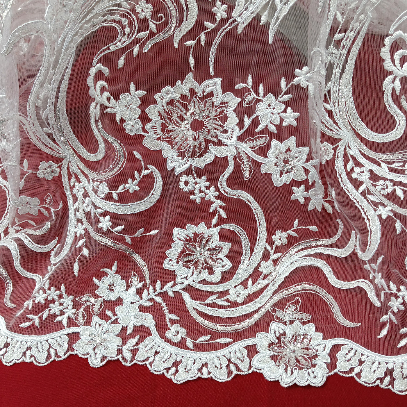 Corded & Beaded Bridal Lace Fabric Embroidered on 100% Polyester Net Mesh.  Sold the yard.  Lace Usa