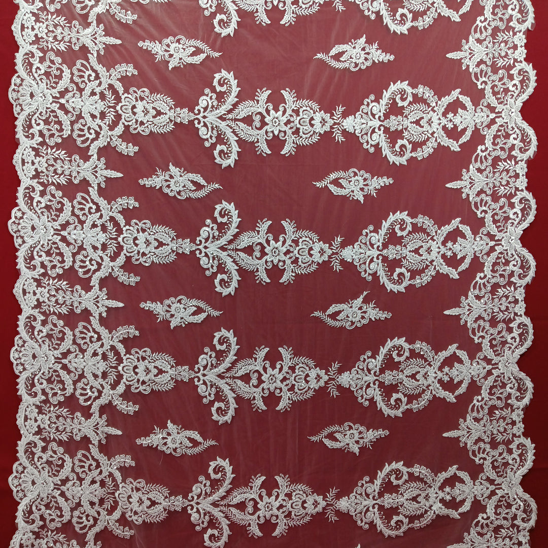 Corded & Beaded Bridal Lace Fabric Embroidered on 100% Polyester Net Mesh.  Sold the yard.  Lace Usa