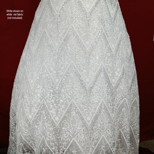 Embroidered & Heavily Beaded with Beads & sequin on Net Mesh Fabric.  Sold by the yard.  Lace Usa