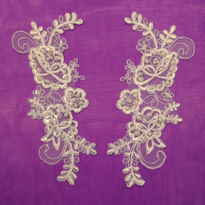 Beaded & Corded Floral Appliqué Lace Embroidered on 100% Polyester Organza or Net Mesh. This can be applied to Theatrical dance ballroom costumes, bridal dresses, bridal headbands endless possibilities. Sold By Pair Lace Usa