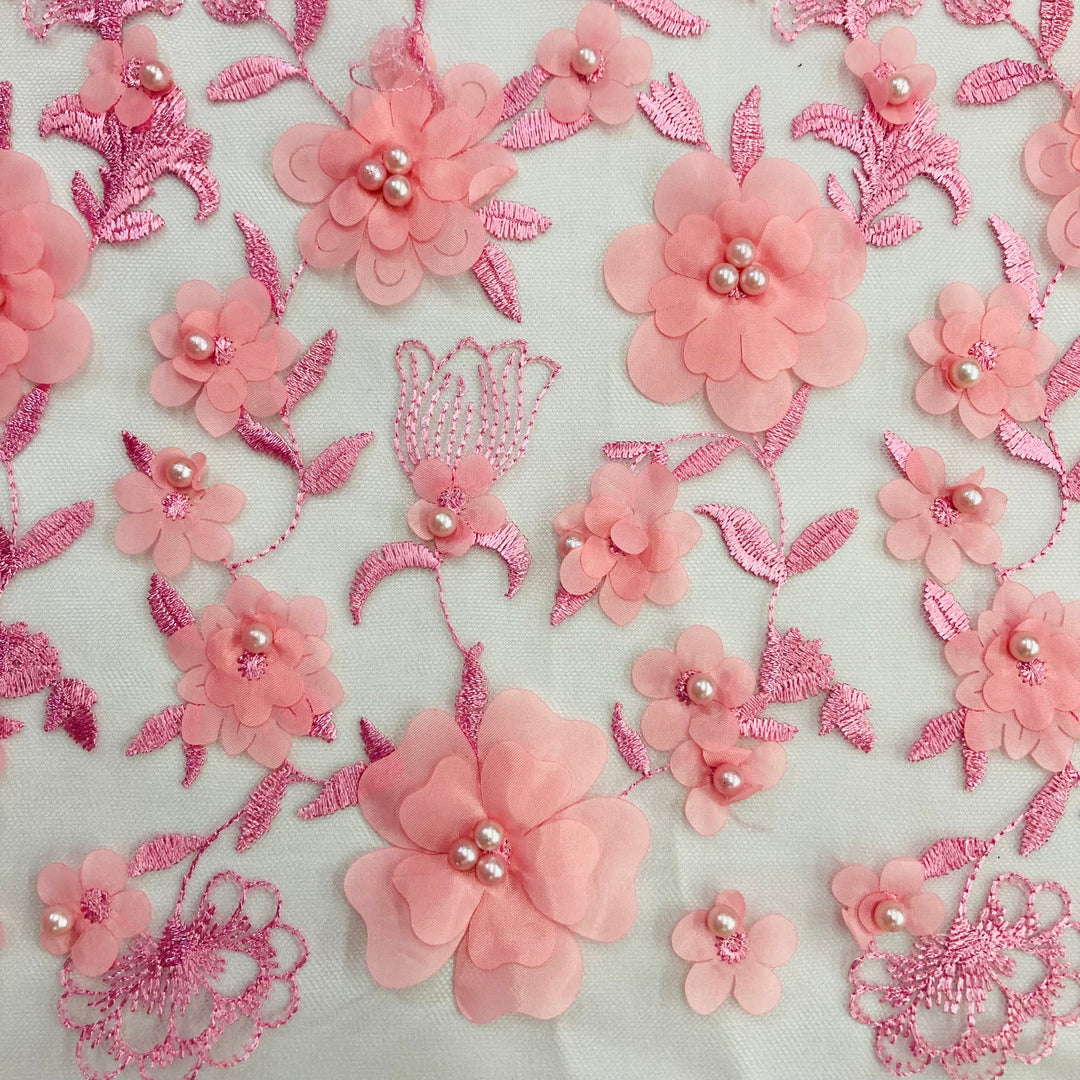 Closeup of light Pink 3D Floral Embroidered & Beaded Net Fabric with Beads. Lace USA