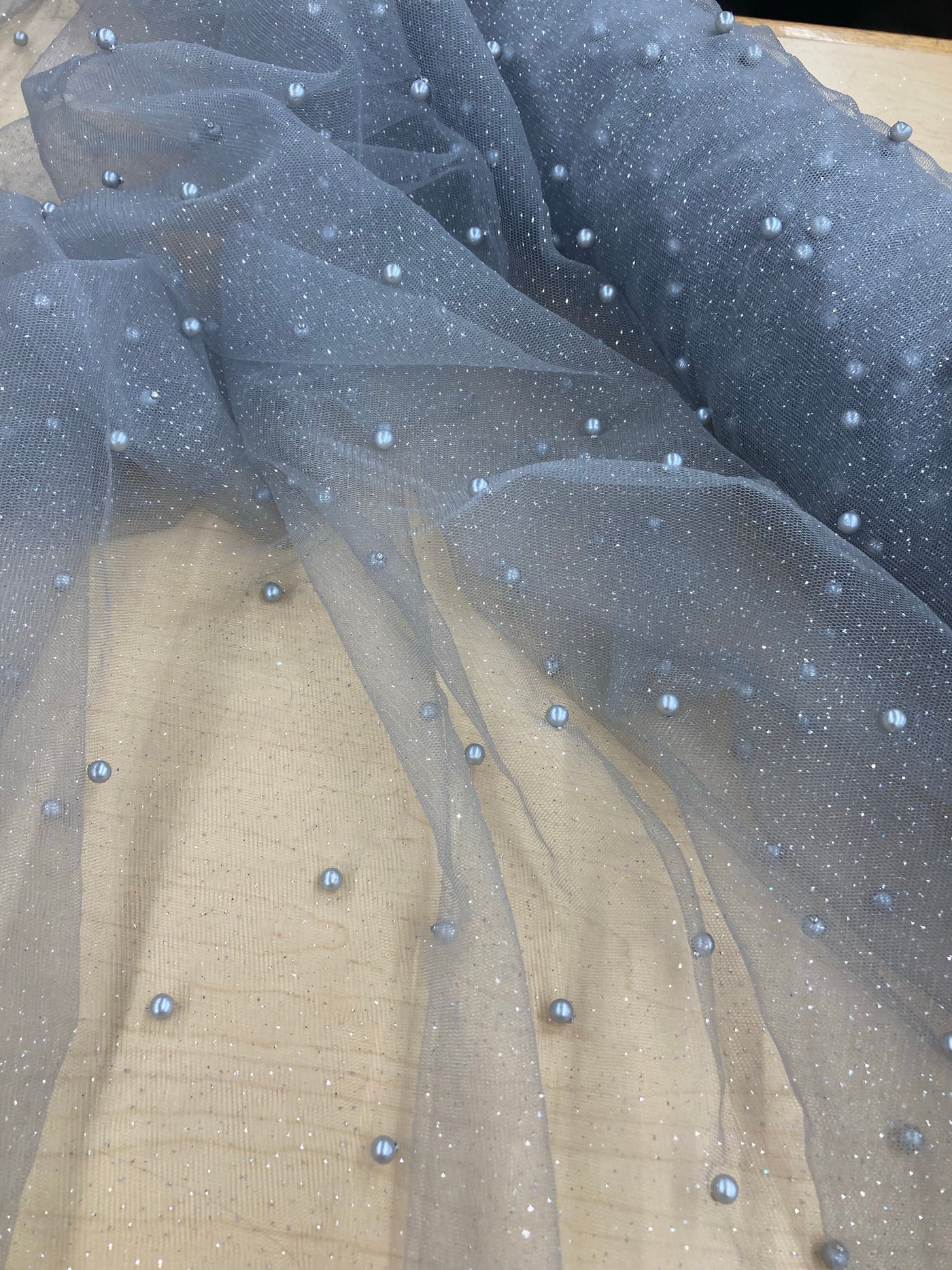 Glitter Mesh Net With Scattered Pearl , 2-Way Stretch, sold by the yard. 100% Polyester 60" wide. This mesh fabric is a 2-way stretch on the width. Pearls are scattered across the mesh.  Sold by the yard, 1-quantity equals to 1-yard.  If you order more than 1-yard, it will be ship in one continuous length.    Lace Usa