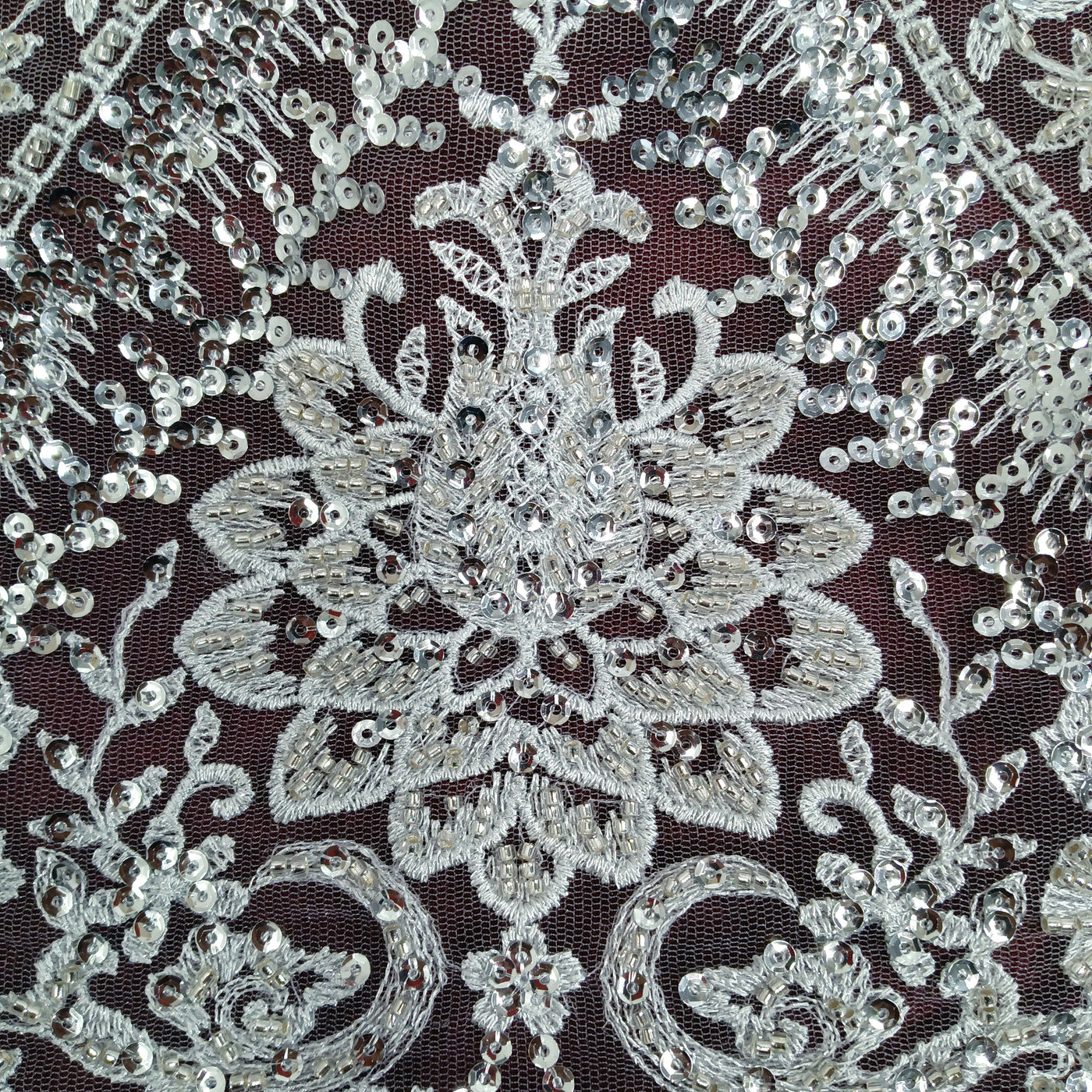 Embroidered & Heavily Beaded with Beads & sequin on Net Mesh Fabric.  Sold by the yard.  Lace Usa